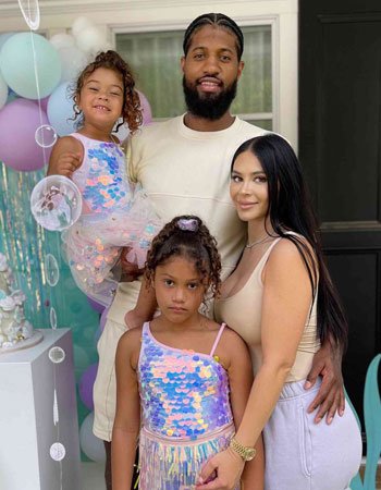 Paul George with his wife and Daughters