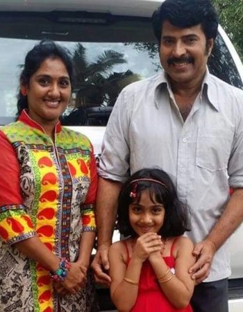 Anju Aravind with his Husband and Daughter